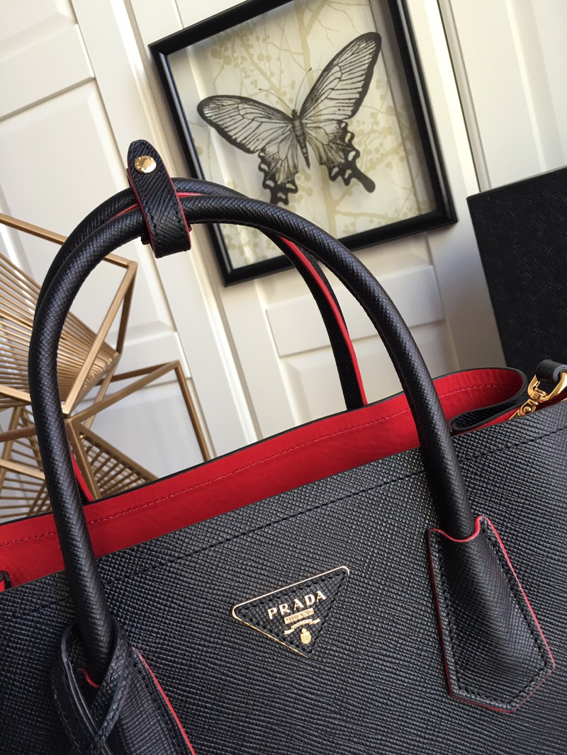 Pra*a top handle bags